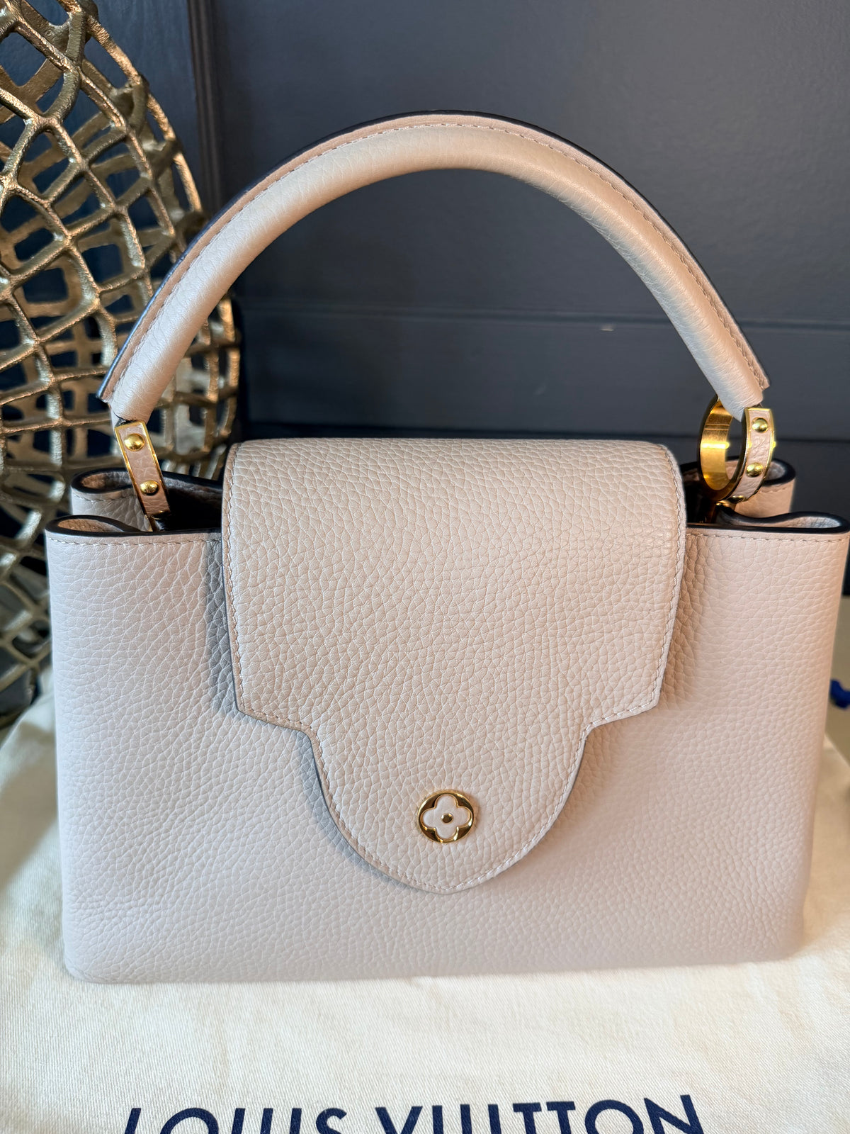 Louis Vuitton grey Capucines — full front view with flap closed