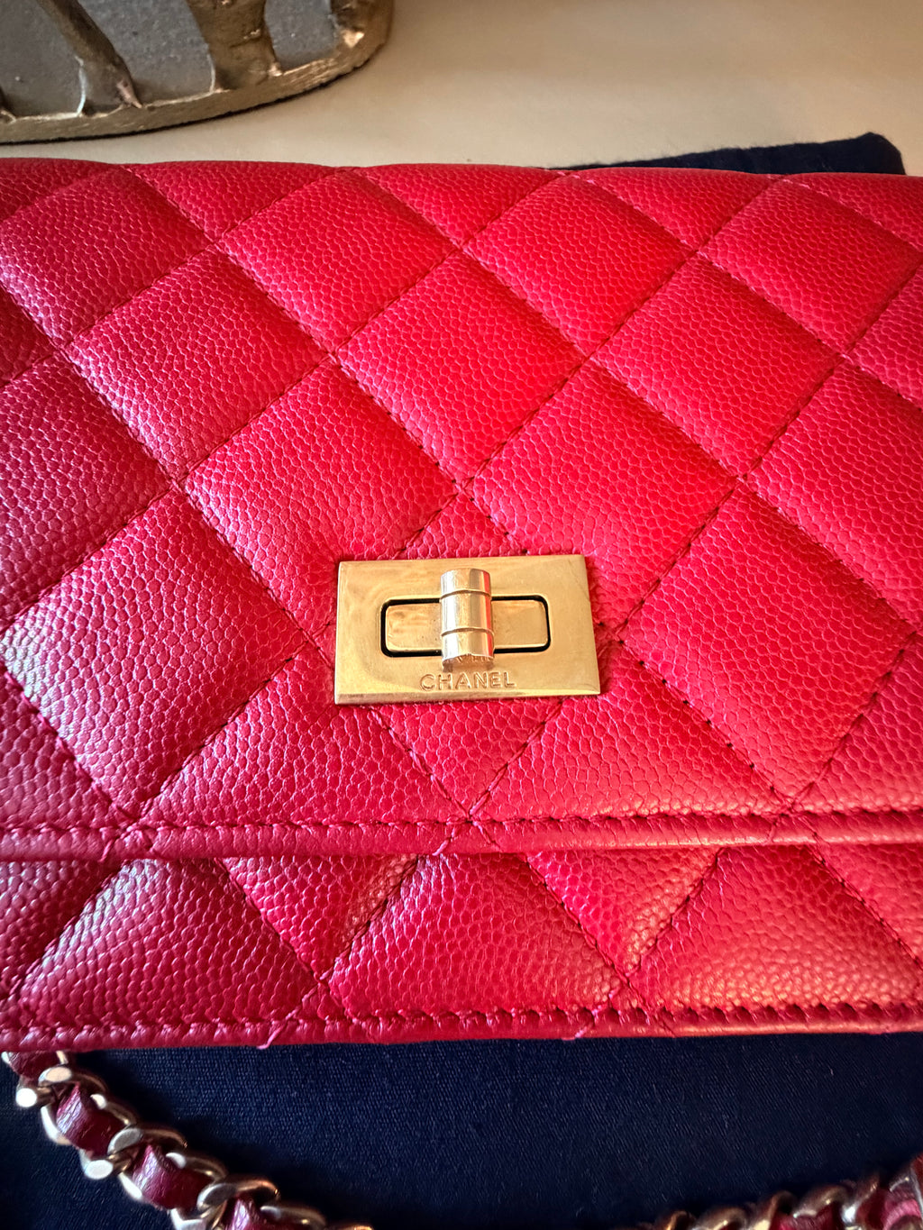 Chanel red caviar wallet on chain front leather and clasp detail