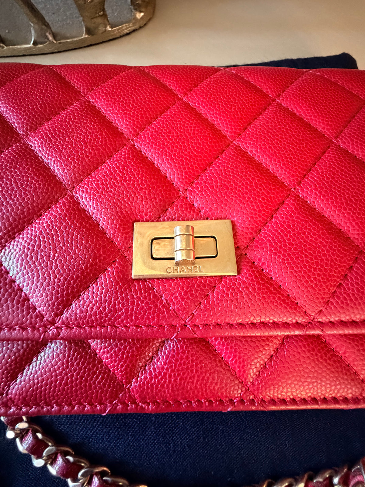 Chanel red caviar wallet on chain front leather and clasp detail
